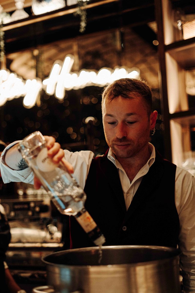Tim Pouring Gin